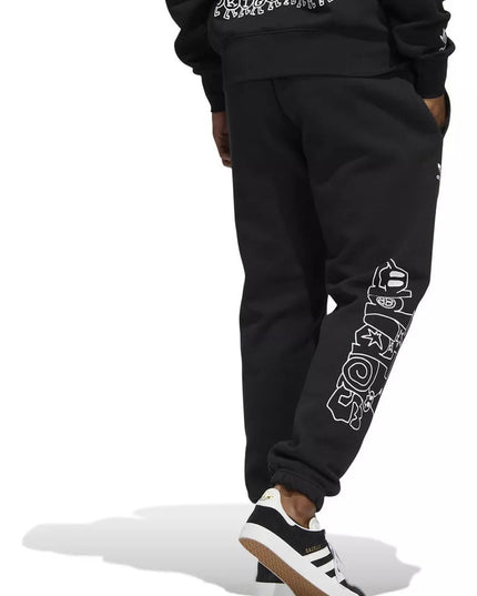 PANTALON DE BUZO ADIDAS ORIGINALS CARTOON GFX SP - BONZER