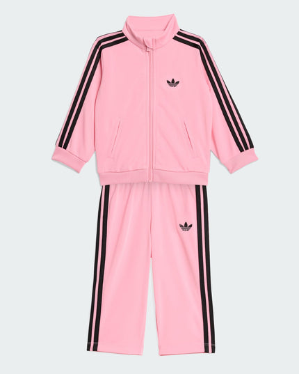 Traje de buzo Adidas Originals Firebird Ts en color rosado.