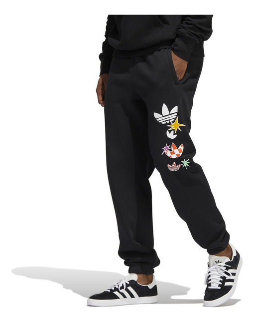PANTALON DE BUZO ADIDAS ORIGINALS CARTOON GFX SP - BONZER