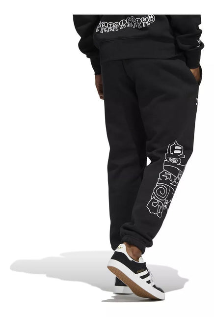 PANTALON DE BUZO ADIDAS ORIGINALS CARTOON GFX SP - BONZER