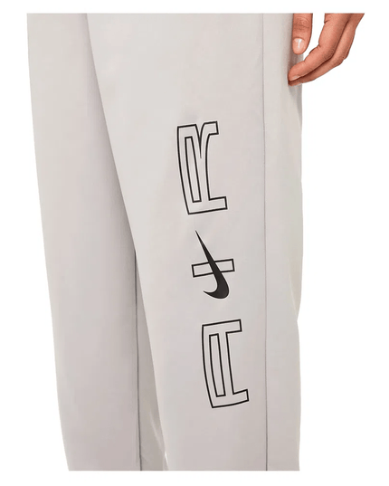 PANTALON DE BUZO NIKE NSW AIR WVN - BONZER